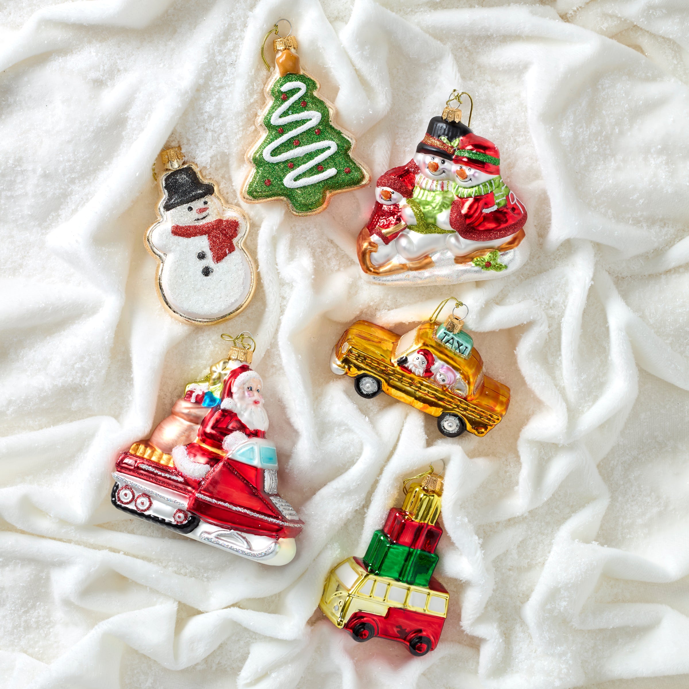 Blown Glass Snowmen On Sled Ornament